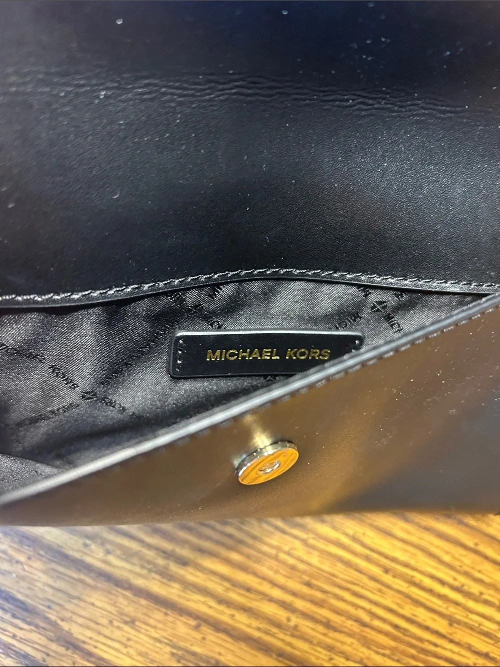 Michael Kors Black Leather Envelope Crossbody with Gold Tone Logo